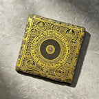 Tibetan Buddhist mandala black slate art tile, angled view showing the printed face and slate thickness.