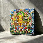 Yellow Manjushri black slate art tile, front view of the printed artwork and natural slate edges.