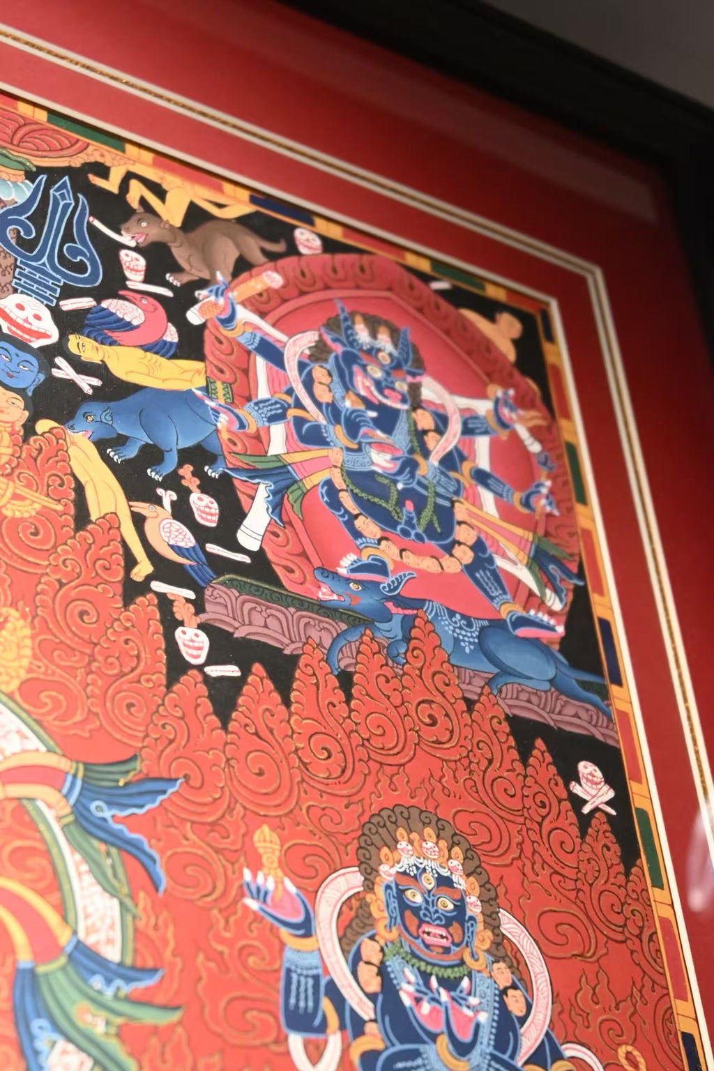 Upper-right corner detail of the framed Mahakala thangka