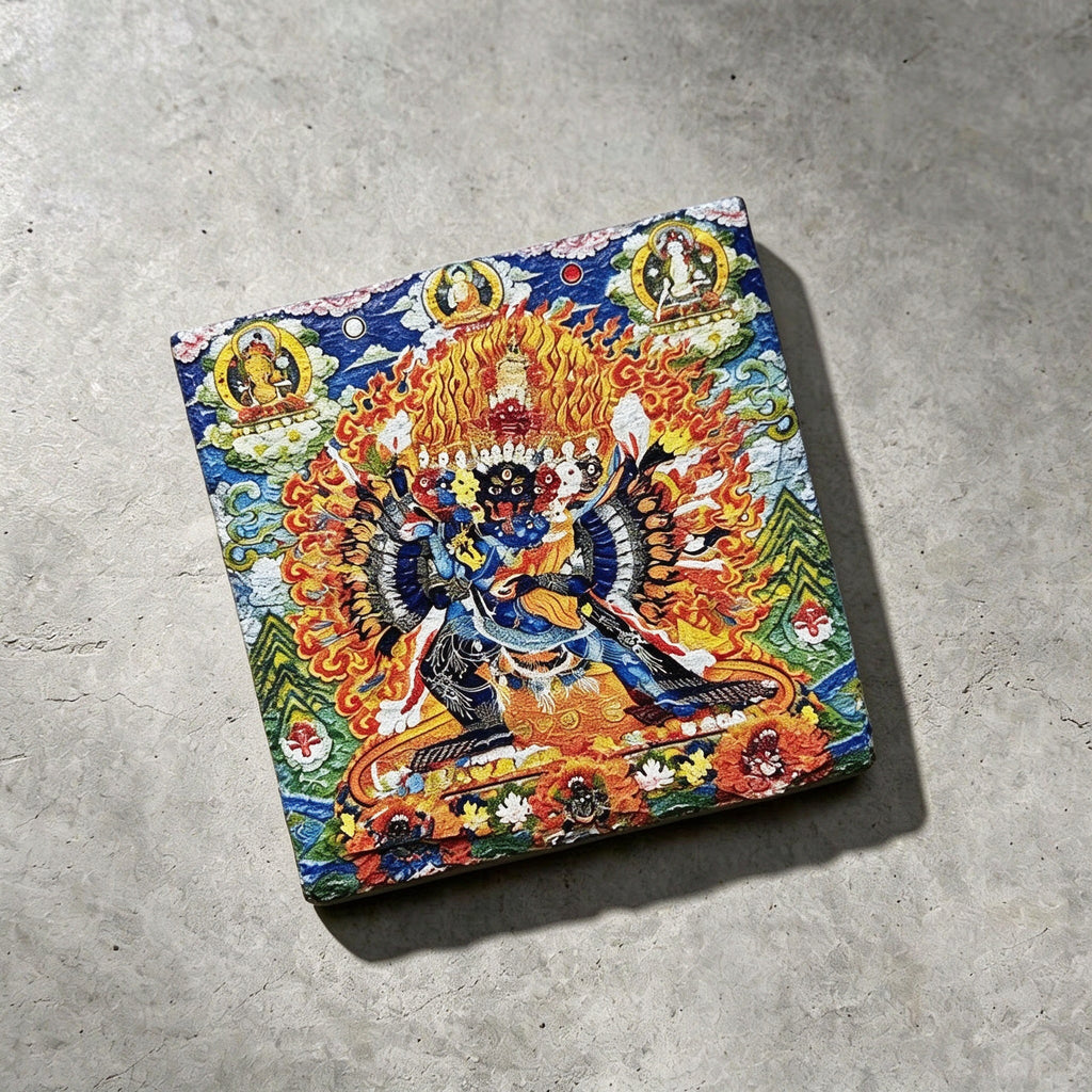 Yamantaka black slate art tile, angled view showing the printed face and slate thickness.
