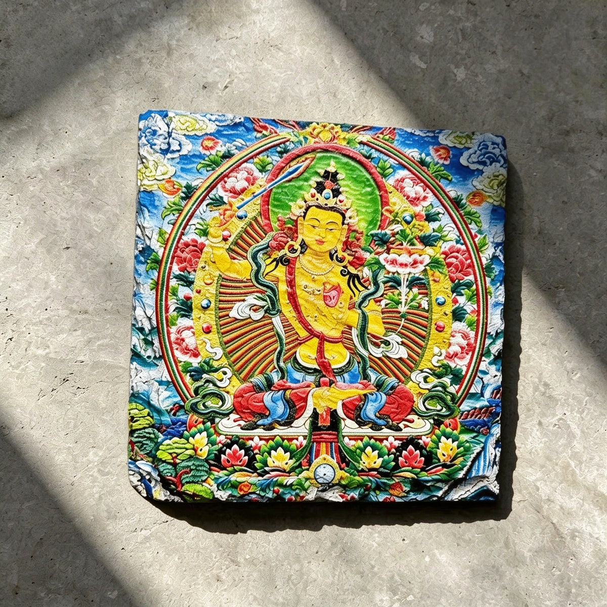 Yellow Manjushri black slate art tile, front view of the printed artwork and natural slate edges.