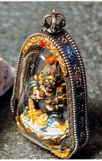 Angled view of the Black Jambhala pendant and decorative case edge