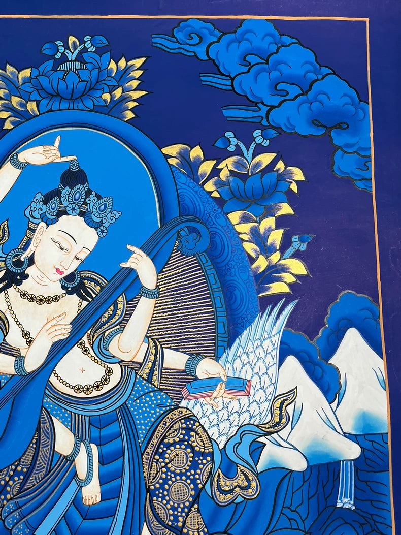 左上方祥雲、背光與花卉 — 妙音天女唐卡