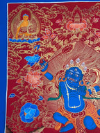Upper-left seated figure and flame halo — Red-ground Acala thangka