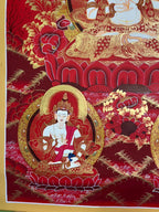 Lower-left figure beneath the lotus throne — Mahasthamaprapta thangka