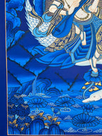 Lower-left robes and waterside landscape — Blue landscape Saraswati thangka