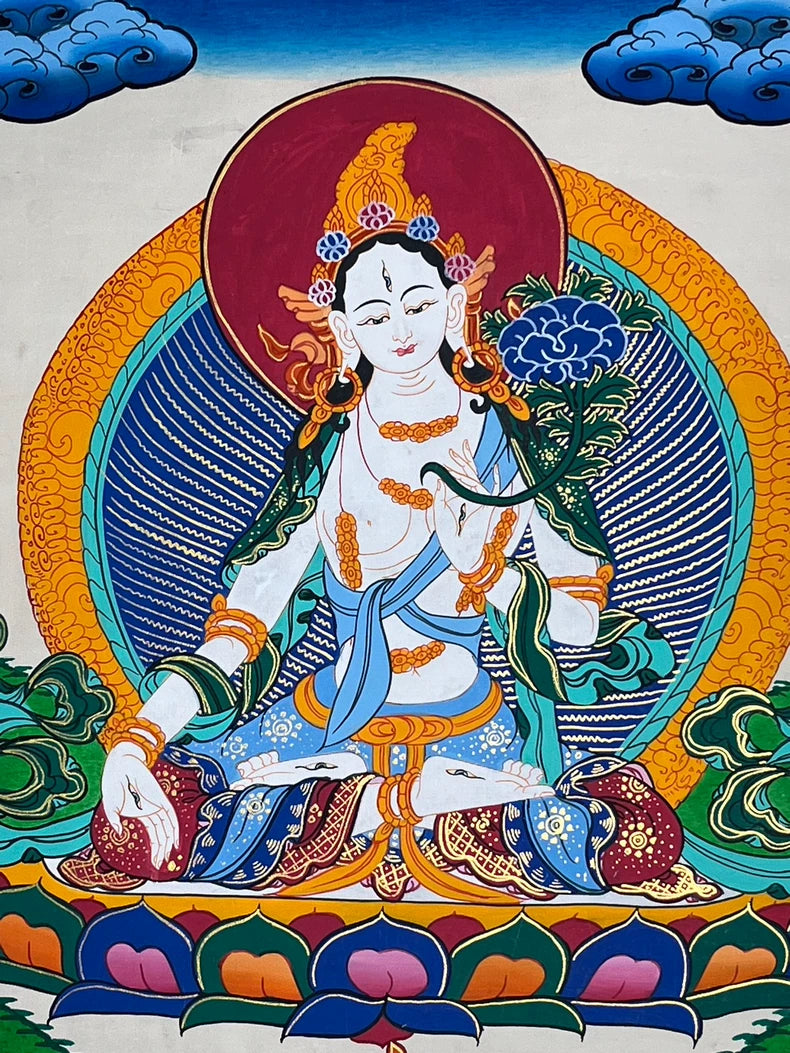 White Tara seated on a multicolored lotus — White Tara landscape thangka
