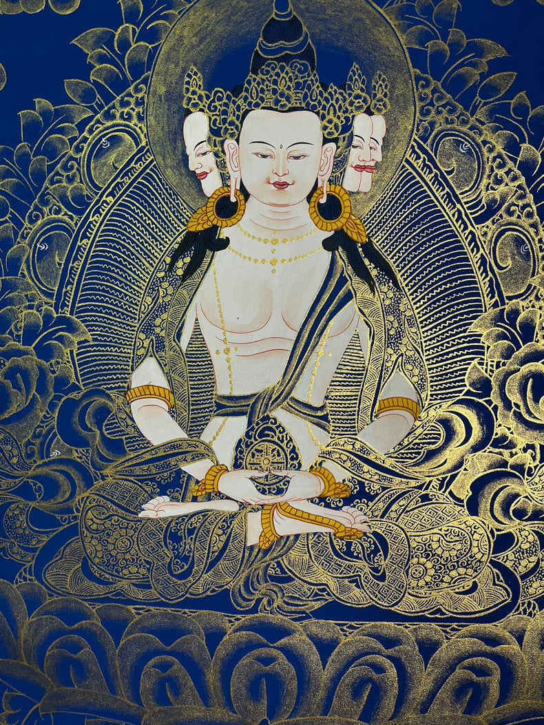 Central figure and intricate gold linework — Blue-and-gold Mahavairocana thangka
