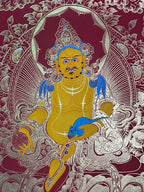 Close view of crown, face and seated figure — Red-ground Yellow Jambhala thangka