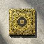 Tibetan Buddhist mandala black slate art tile, front view of the printed artwork and natural slate edges.