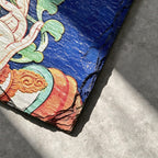 Lotus and hand black slate art tile, close-up of the printed details, surface texture and slate edge.