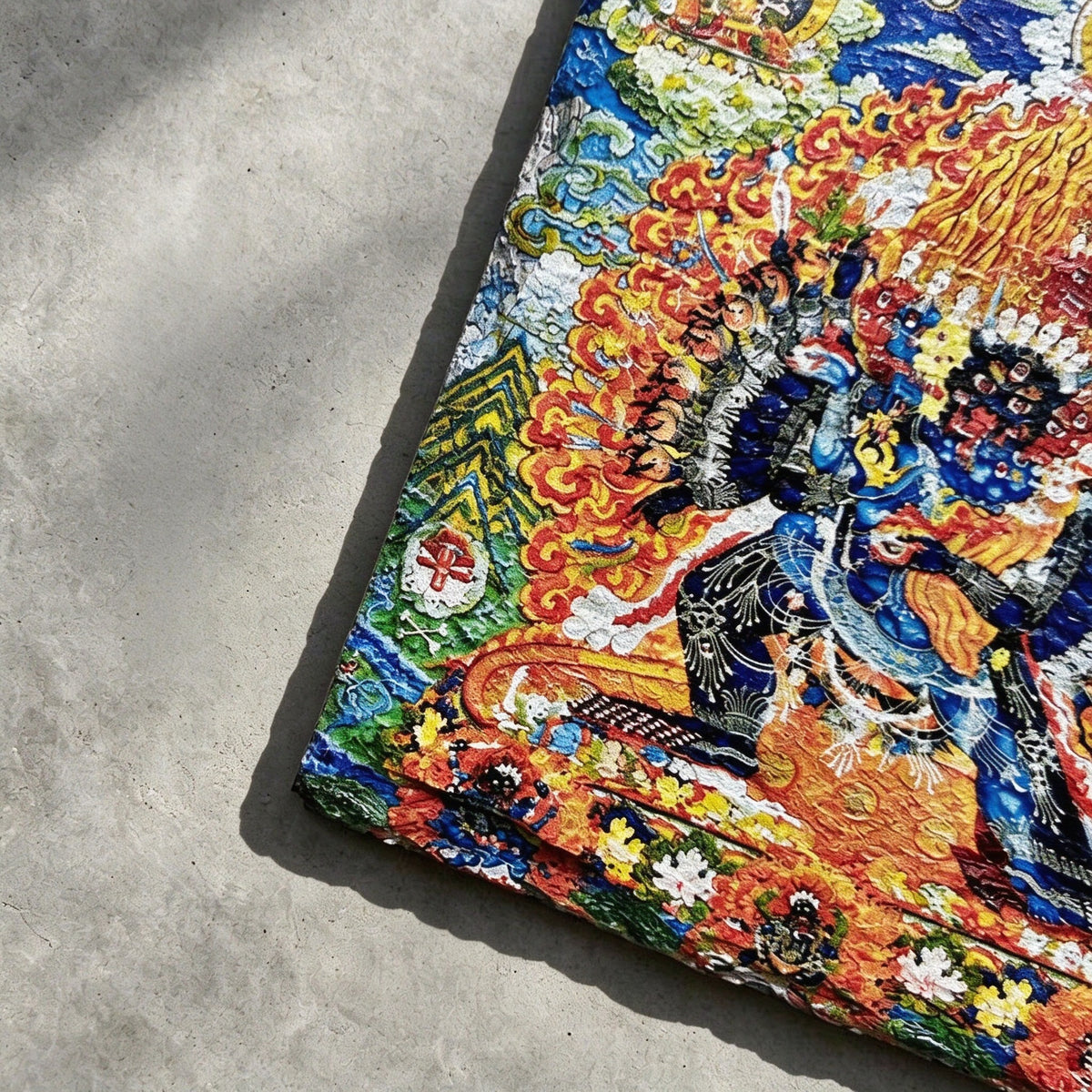 Yamantaka black slate art tile, close-up of the printed details, surface texture and slate edge.