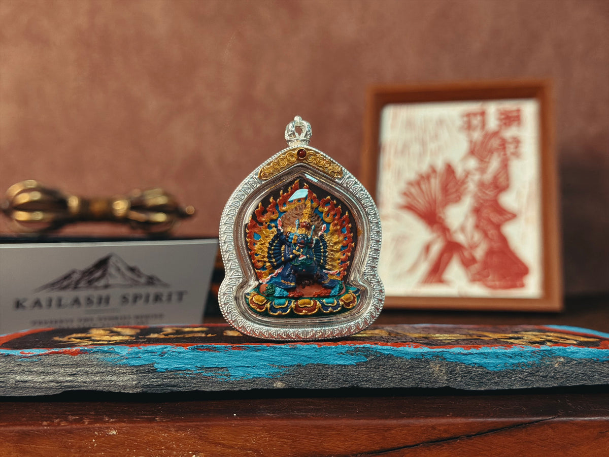 Yamantaka tsa tsa gau pendant displayed with a Kailash Spirit card