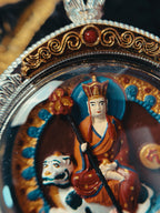 Ksitigarbha figure and engraved case detail