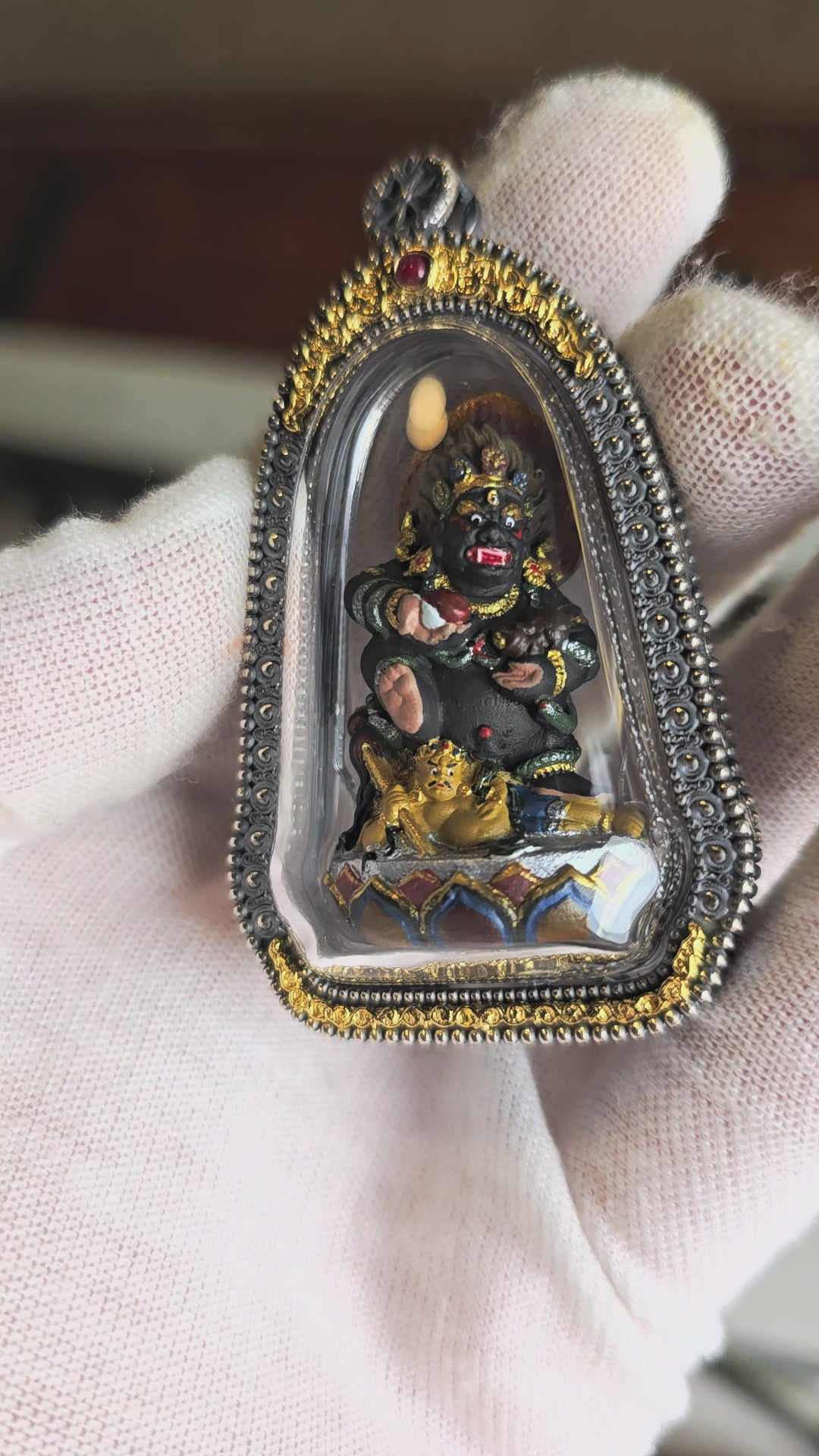 Hand-Painted Black Jambhala Tsa Tsa Pendant in a 925 Silver Case